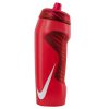 [Image of a person using the red Nike NOBA662-924 thermos]